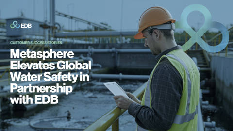 man with hard hat and tablet device