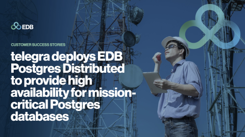 man with hard hat next to cell tower